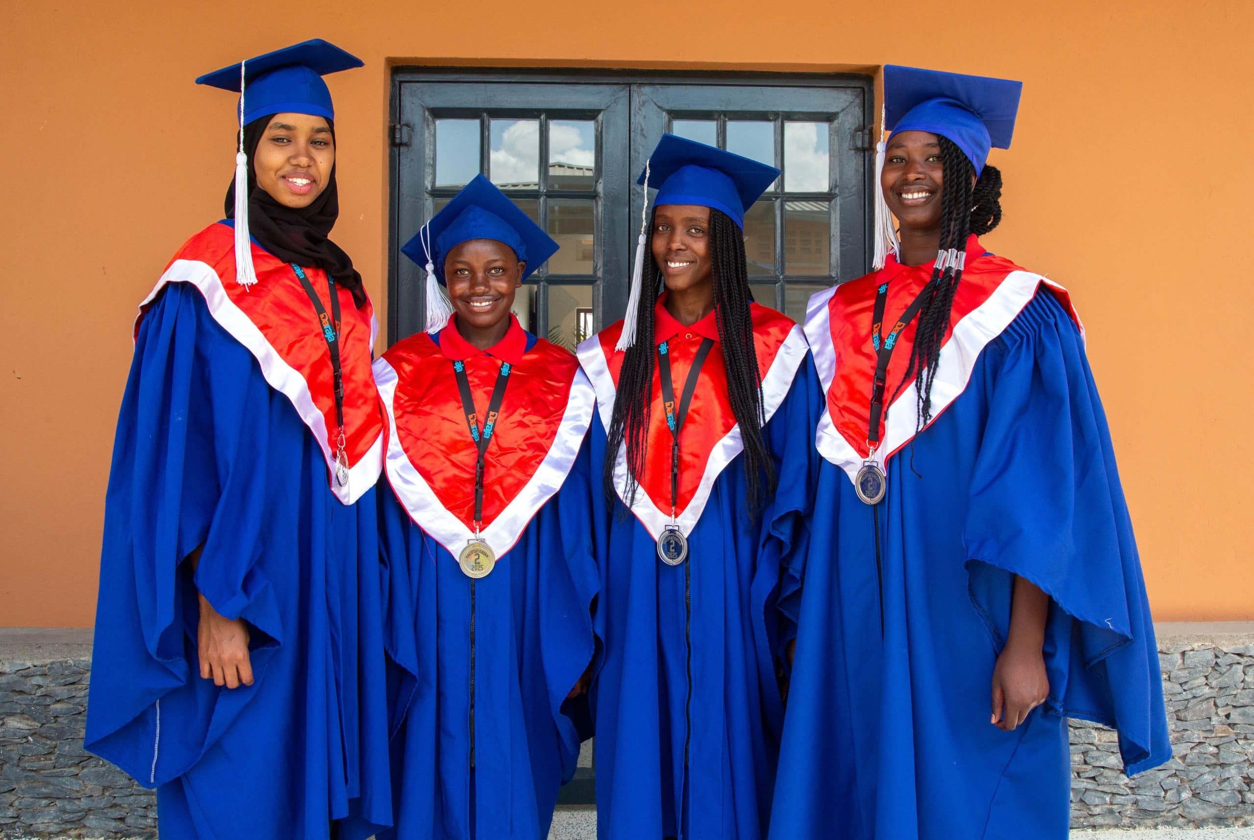 Daraja's Class of 2025 in graduation caps and gowns